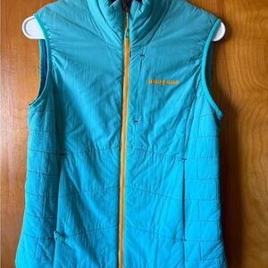 Patagonia Turquoise Vest with Bright Orange Accents